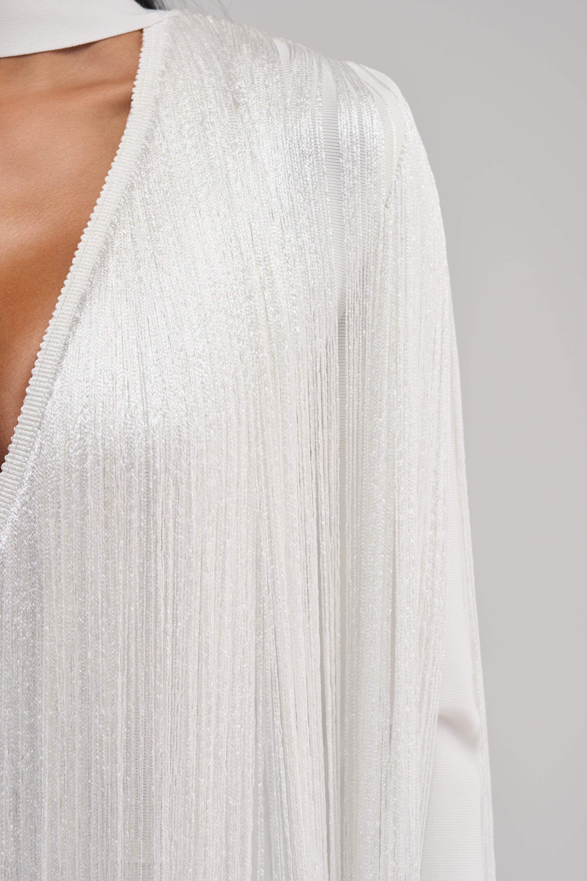 BELLE BANDAGE JUMPSUIT WITH FRINGE IN WHITE