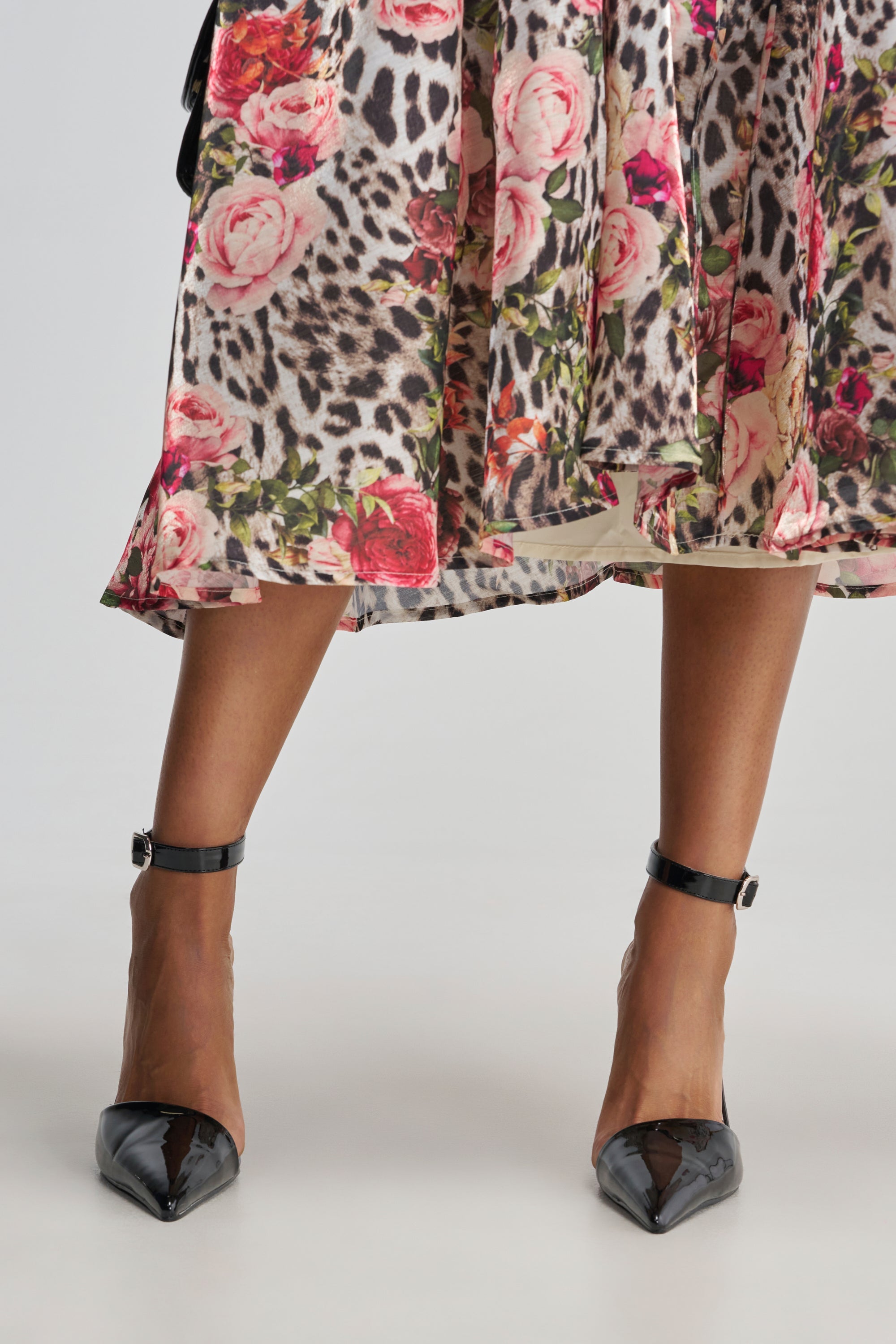 AZALEA WANG DESIREE BLACK PUMP WITH ZEBRA LINING
