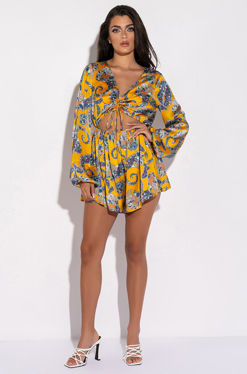 ADMIT IT LONG SLEEVE PRINTED ROMPER WITH CUT OUT